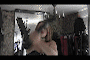 Jen tries on her new corset and flared mini skirt with opera gloves and crotch high boots.